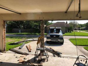 3.removing the old frame and garage door