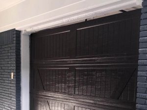 brown wooden garage door installation