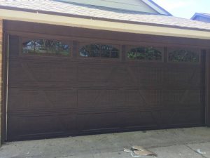 two car wooden garage door with windows