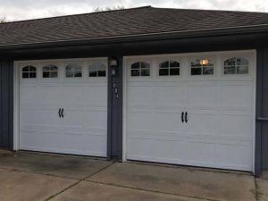 two-white-carrige_style_garage_door_with_windows (2)