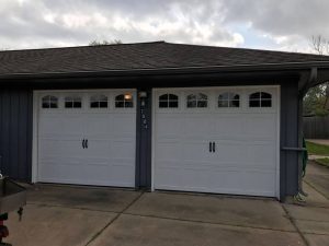 two-white-carrige_style_garage_door_with_windows (3)