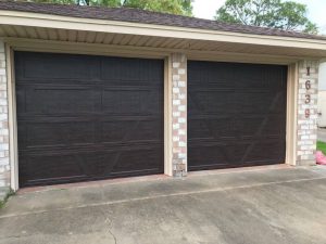 two wooden garage doors (2)