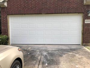 white aluminum garage door installation