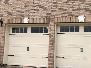 white carrige style two garage door with windows (3)