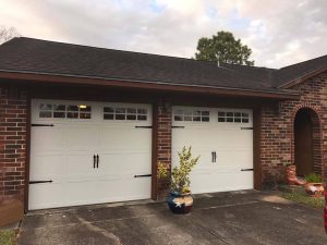 white carrige style two garage doors